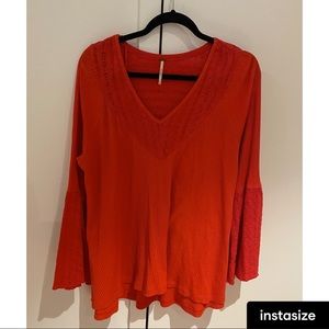 free people orange thermal blouse with wide sleeves and embroidered lace